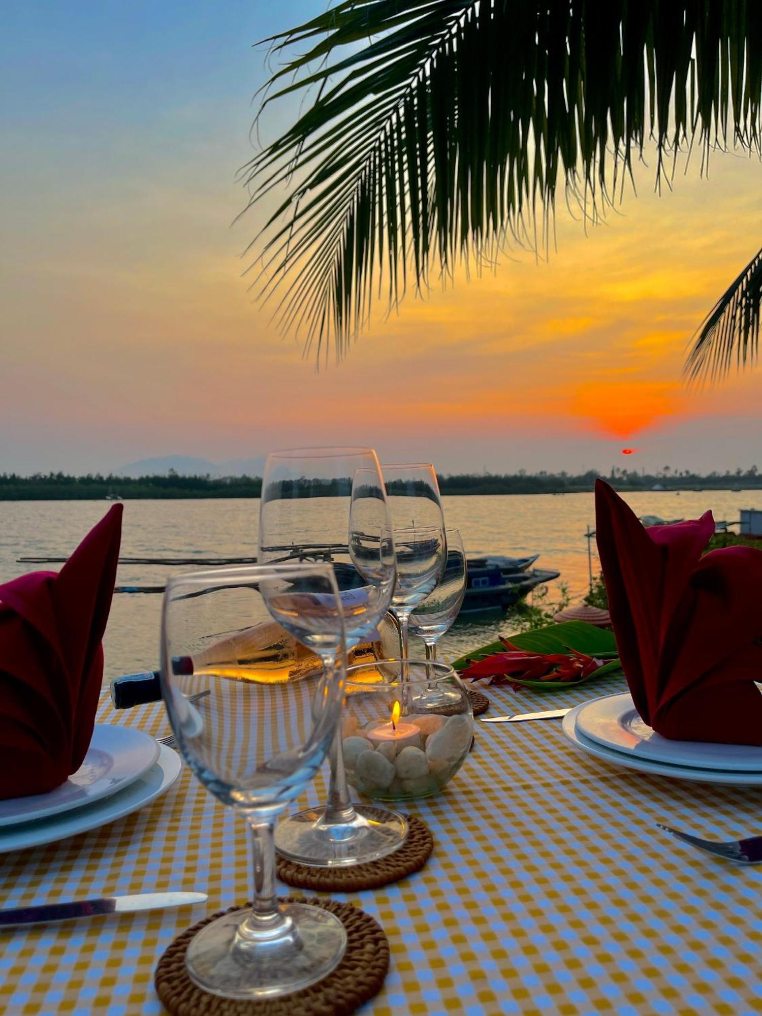 Bel Marina Hoi An Resort Екстериор снимка Sunset at the Riverine Restaurant