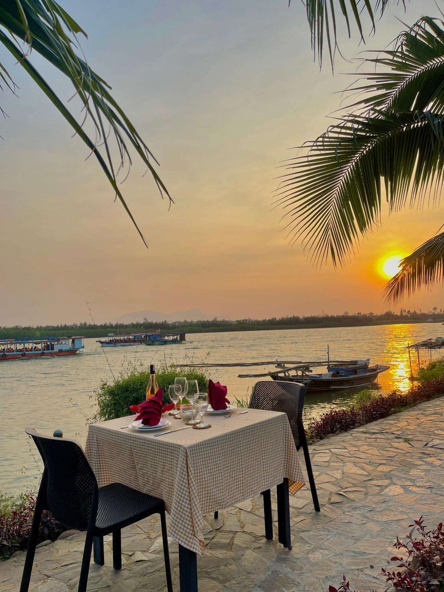 Bel Marina Hoi An Resort Екстериор снимка Sunset at the Riverine Restaurant